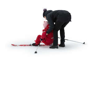 cut out woman helping her daughter up when skiing