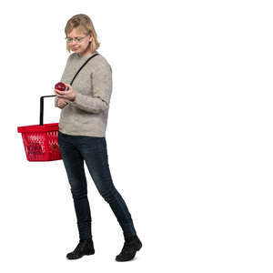 cut out woman buying apples at a grocery store