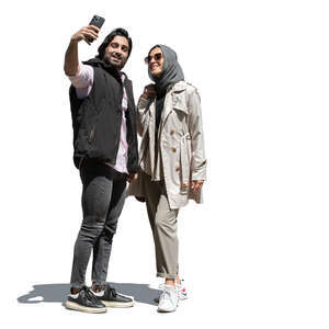 two cut out middle eastern friends taking a selfie