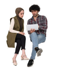 two cut out middle east people sitting and discussing things