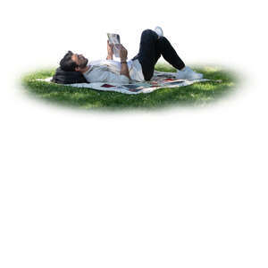 cut out man lying in the tree shade on the grass and reading a newspaper