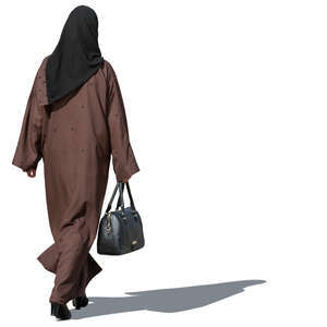 muslim woman in a brown abaya walking
