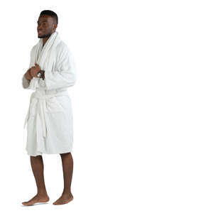cut out black man in a bathrobe walking barefoot