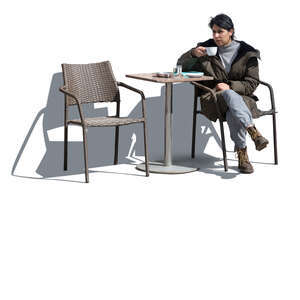 cut out woman sitting in an outdoor cafe