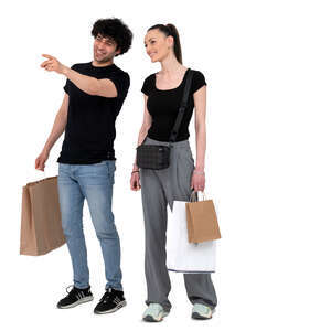 cut out man and woman with shopping bags standing and pointing