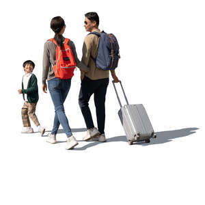 cut out asian family with bags and suitcases walking