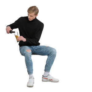 cut out man sitting in a bar and drinking beer