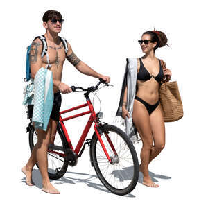 cut out man and woman walking on the beach with a bike