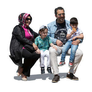 cut out muslim family with two kids sitting on a bench outside
