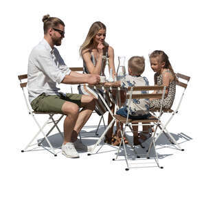 cut out family in a an outdoor restaurant sitting and eating