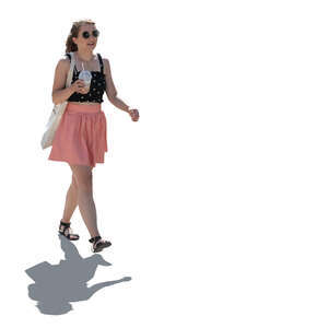 cut out backlit woman walking and drinking ice coffee