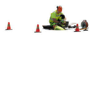 two cut out workmen working in the manhole on the street