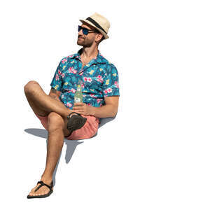 cut out man with a summer hat sitting and drinking a soft drink