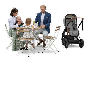 cut out family with small children sitting in a restaurant