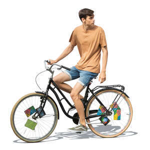 cut out young man riding a bike