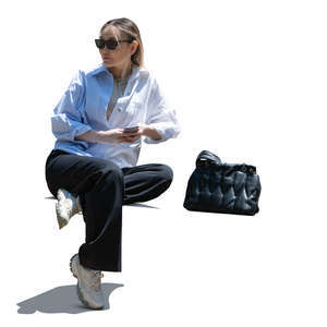 backlit asian woman sitting