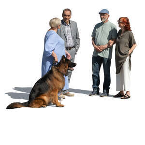 group of older people with a dog standing and talking