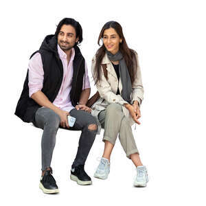 cut out middle eastern man and woman sitting