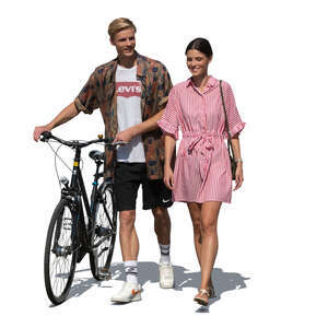 two cut out young people with a bike walking on a sunny summer day