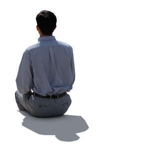 cut out backlit man sitting seen from back angle