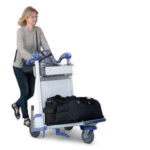 woman pushing an airport trolley walking