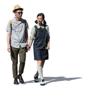 cut out young asian couple walking hand in hand