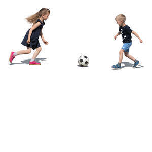 two kids playing football outside in summer