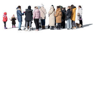 large group of people standing outside on a sunny winter day