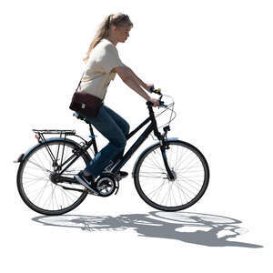 backlit woman riding a bicycle