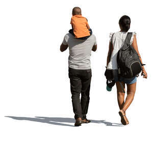 black family with a little boy sitting on his fathers shoulders walking