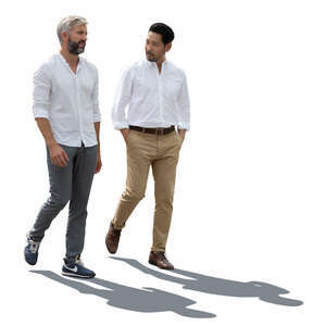 two backlit men walking