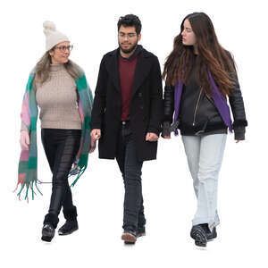 group of three friends walking on a winter day