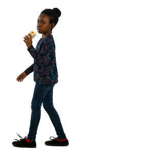 little black girl walking and drinking juice