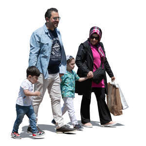 middle eastern family with two kids walking