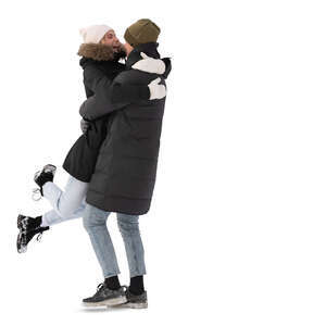 couple hugging happily in winter