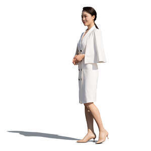 asian woman in a white dress standing