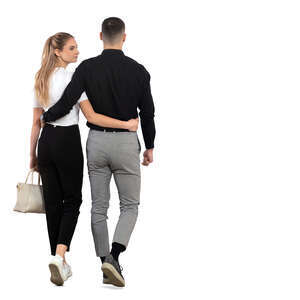 couple walking and woman looking back over her shoulder