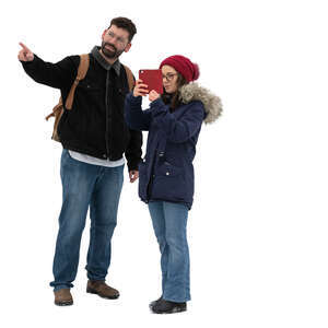 man pointing and woman taking a picture