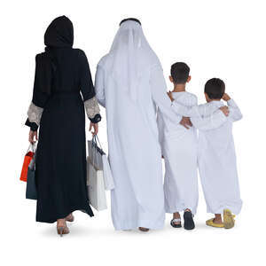 traditional arab family walking