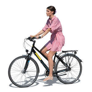 woman in a striped summer dress riding a bike