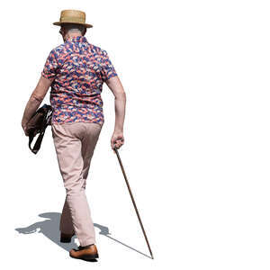 older gentleman with a walking stick walking