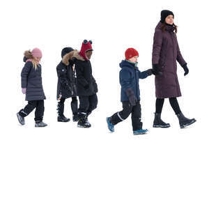 group of young school children and a teacher walking 
