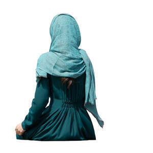 muslim woman sitting seen from back angle