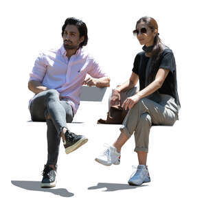 man and woman sitting outside
