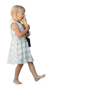 little girl walking and eating an ice cream