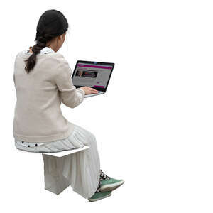 asian woman sitting and working with computers