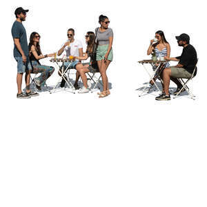 group of people hanging out in an outdoor restaurant