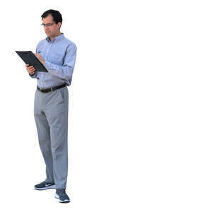 man standing and writing notes
