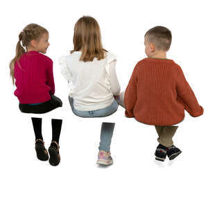 three kid sitting and talking