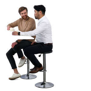 two men sitting in a bar and drinking coffee
